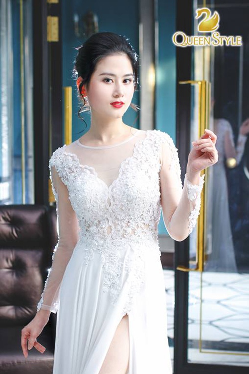 Đầm dạ hội màu trắng sang trọng với những thước vải ren cao cấp